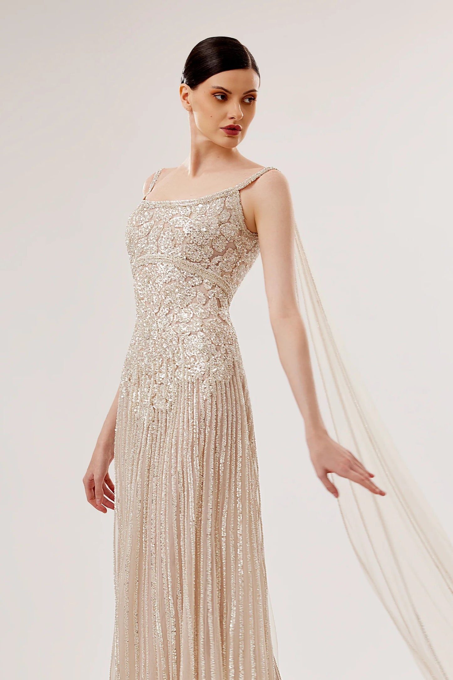 Tulle Sleeveless Gown with Flowing Shoulder Trail